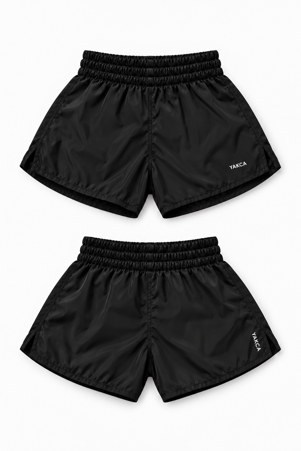 YAKCA FIGHTWEAR black Muay Thai shorts with small white YAKCA logos, plain elasticated waistband and lightweight fabric with a subtle sheen, front and back views
