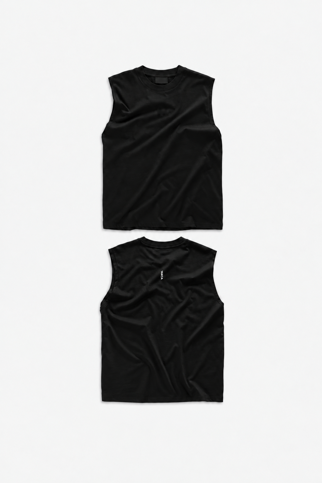 YAKCA FIGHTWEAR black cotton Tank Top with a plain front and small vertical white YAKCA logo on the upper back, front and back views in 2:3 portrait format